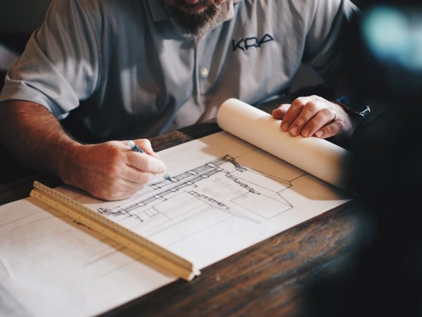 Engineer reviewing construction project blueprints