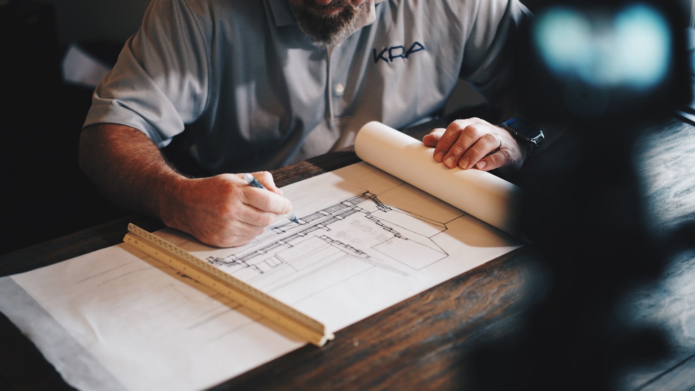 Engineer reviewing construction project blueprints